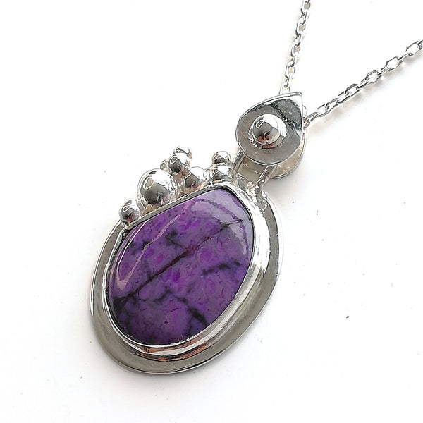 Purple stone pendant
